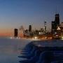 Ice forms along the shore of Lake Michigan before sunrise, Thursday, Jan. 31, 2019, in Chicago. The painfully cold weather system that put much of the Midwest into a historic deep freeze was expected to ease Thursday, though temperatures still tumbled to record lows in some places. (AP Photo/Kiichiro Sato)