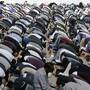Muslims pray during Friday prayers at Hagley Park in Christchurch (Mark Baker/AP)
