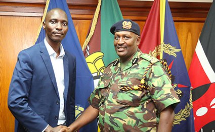Inspector General of Police Hillary Mutyambai (right) shakes hands with three-times World 1,500m champion Abel Kiprop after their meeting at the National Police Service headquarters at Jogoo House in Nairobi on April 30, 2019. PHOTO | NATIONAL POLICE SERVICE |