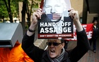 People protest outside Southwark Crown Court where WikiLeaks founder Julian Assange will be sentenced, in London, Britain, May 1, 2019. REUTERS